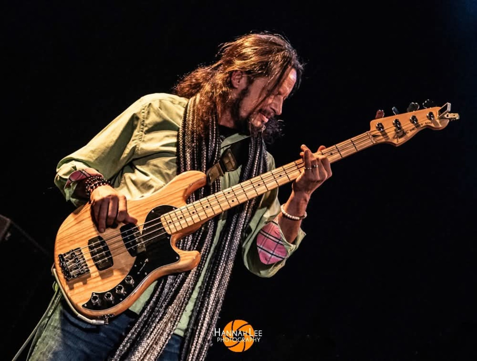 Rodney Wallin playing bass onstage