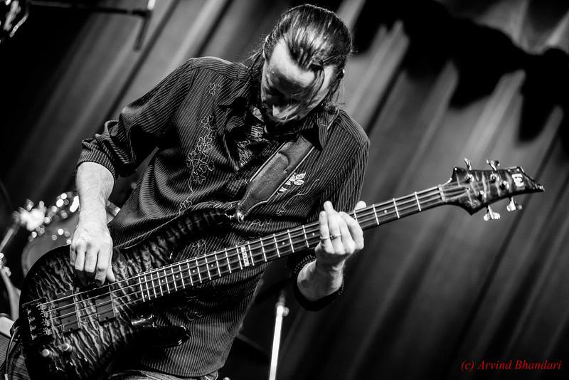 Rodney Wallin playing bass during a live performance